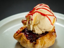 ice cream on top of a pastry